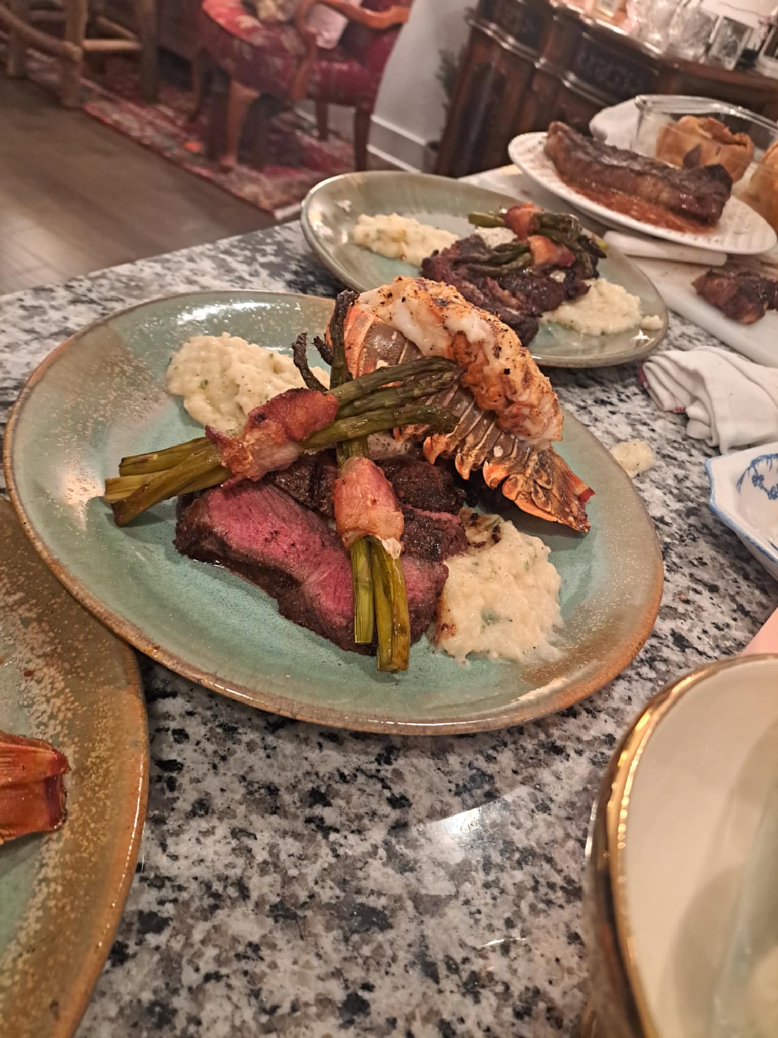 Steak and lobster tail plated
